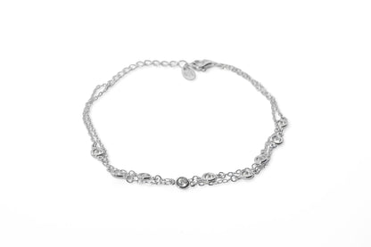 Bracciale in argento 925/°°° a due fili con zirconi